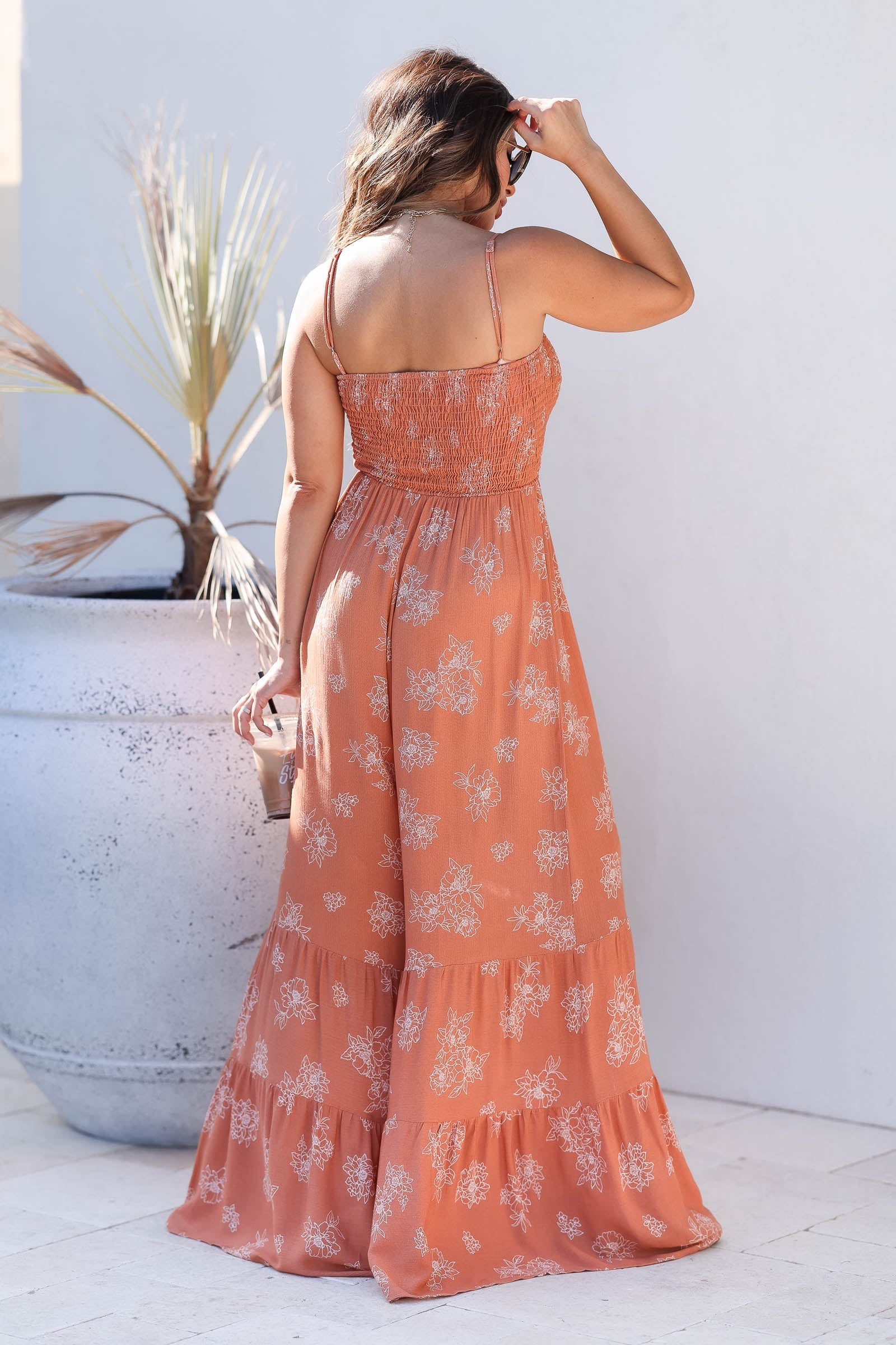 He Said She  Said Smocked Jumpsuit - Light Rust closet candy women's trendy sleeveless adjustable strap smocked bodice tiered ruffled wide leg floral jumpsuit front